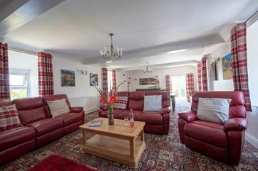 Relax in comfort in the huge sitting-room.