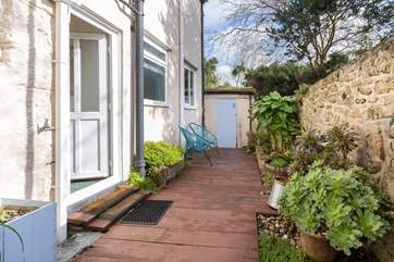 The outside space is a lovely place to sit back and relax.