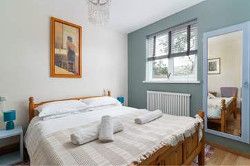 The bedroom has a king size double bed.