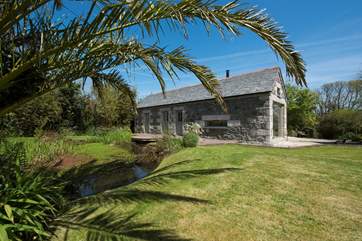 Marbles backs onto a pond in this peaceful setting.