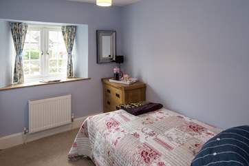 The single bedroom (bedroom 2) offers comfort and space.