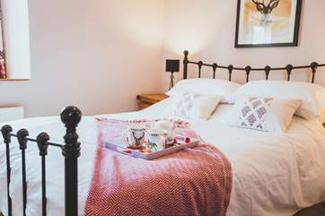 The Main bedroom offers the perfect room to recharge after a day of exploring.