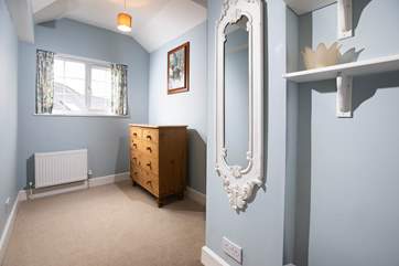 There is a dressing-room on the first floor, ideal for storing away your suitcases.