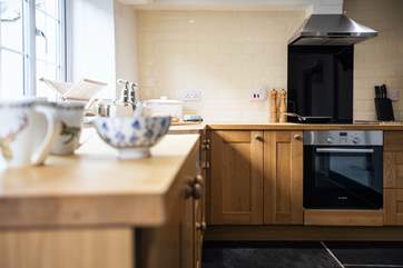 The kitchen is fully equipped for your enjoyment.