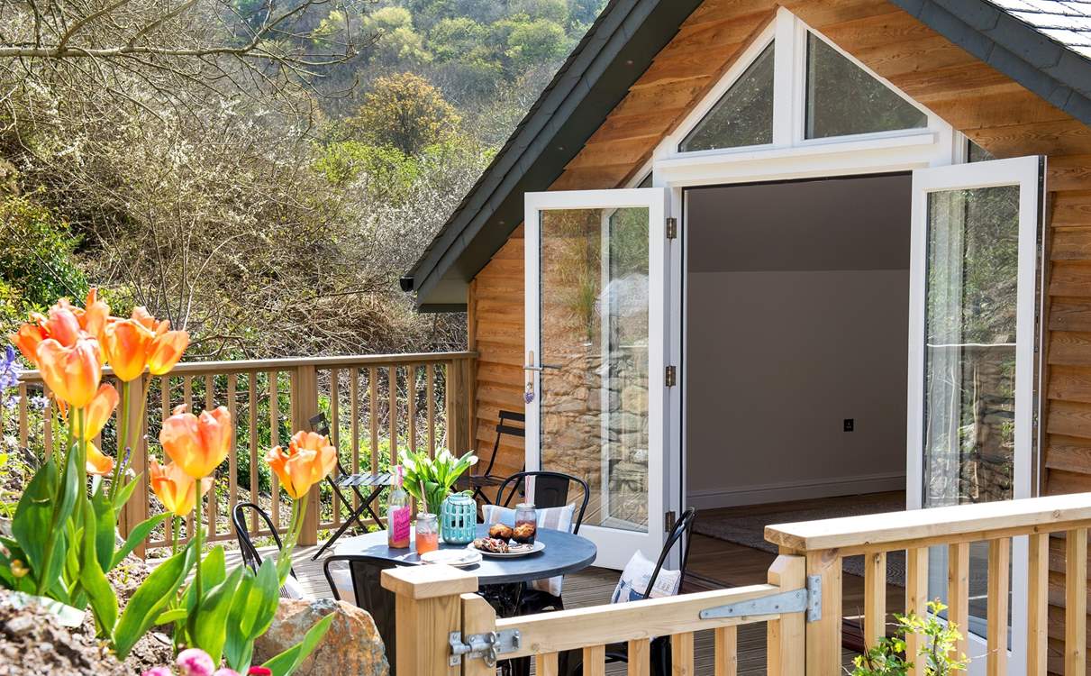 The decking-area is a great spot for al fresco dining.