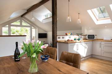 The dining-area is alongside the kitchen.