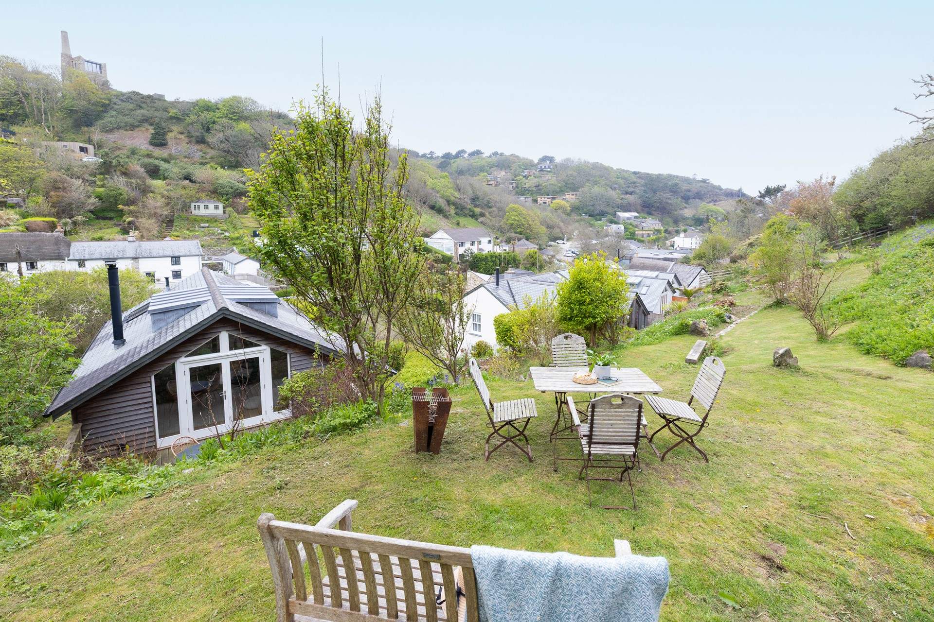 If you wonder up the hill there is a table and chairs for an elevated view. 