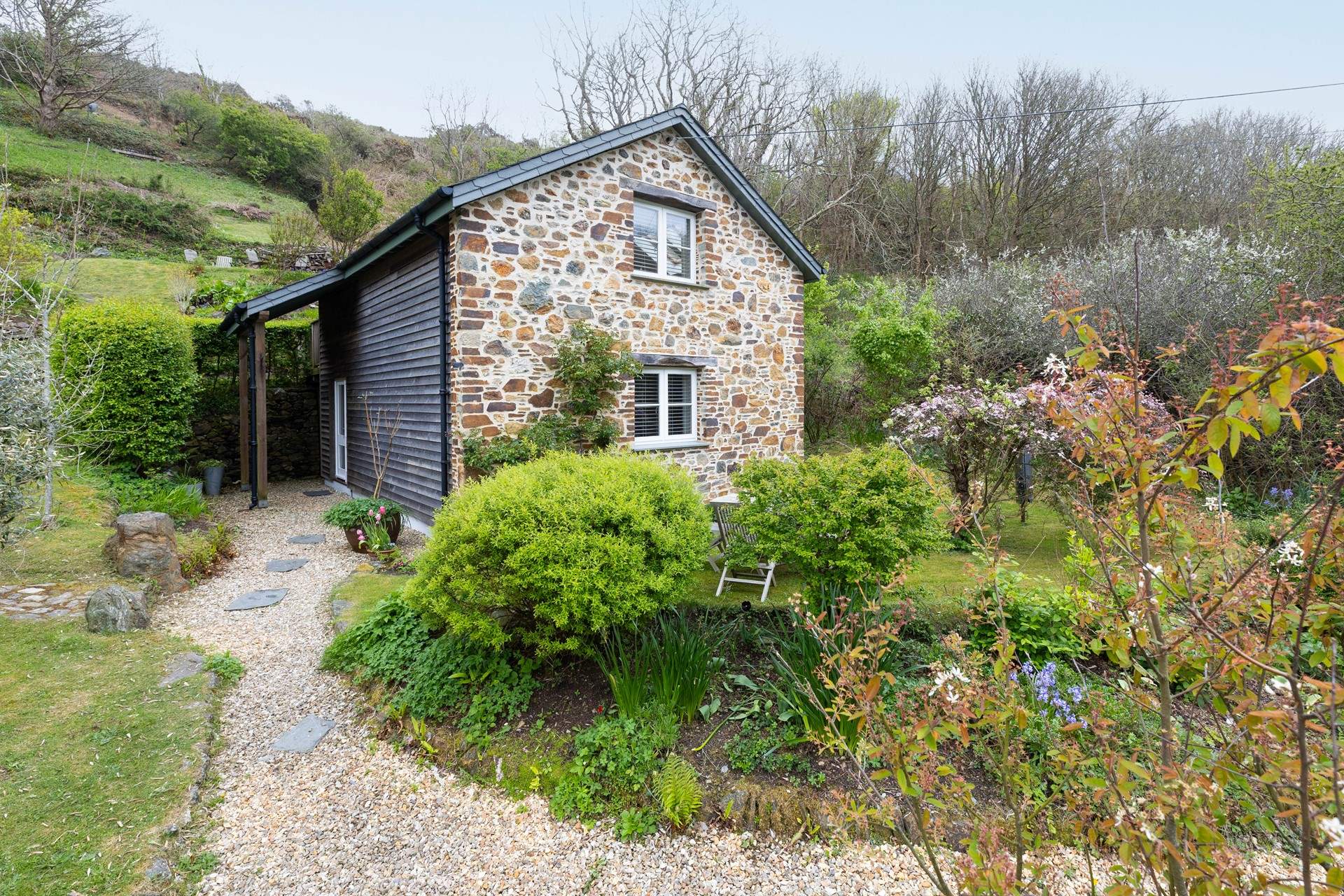 Beautiful planting leads from the car park to your oasis. 