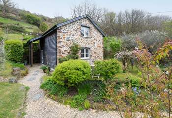 Beautiful planting leads from the car park to your oasis. 