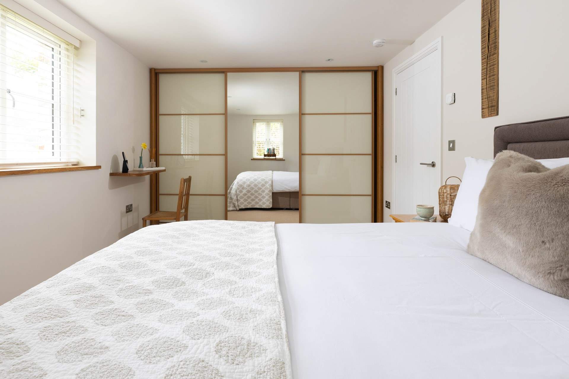 The main bedroom has a sumptuous king size bed.