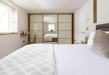 The main bedroom has a sumptuous king size bed.