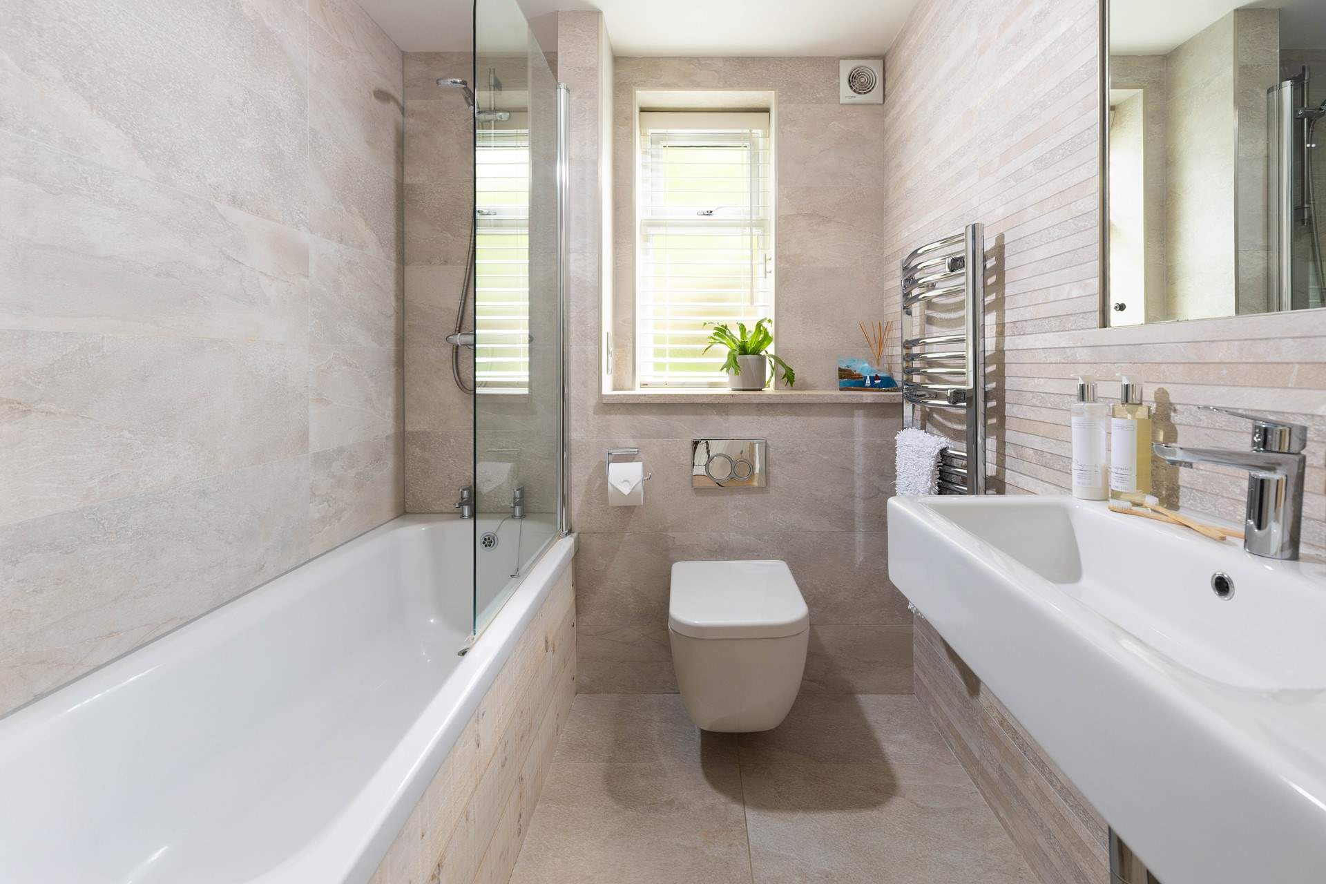 The family bathroom is light and bright. 