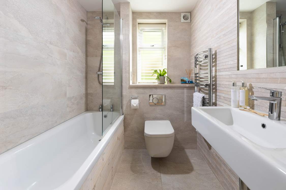 The family bathroom is light and bright.