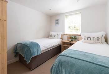 The twin bedroom offers great flexibility for guests staying. 