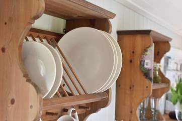 The owners have very thoughtfully chosen lovely crockery and ornaments throughout to complement the style of this beautiful shepherd's hut.