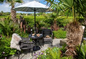 The bistro table is the prime spot for a glass of wine as the sun goes down.