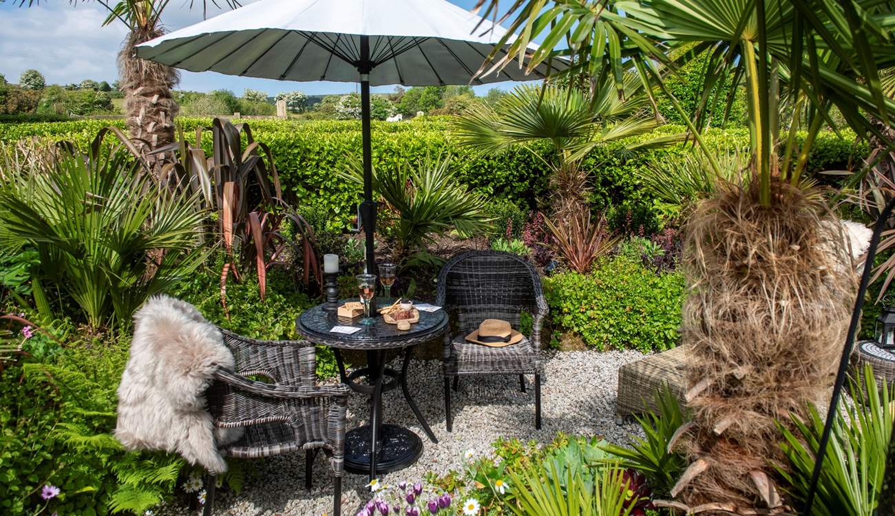 The bistro table is the prime spot for a glass of wine as the sun goes down.