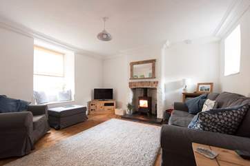 Relax in front of the roaring wood-burner.