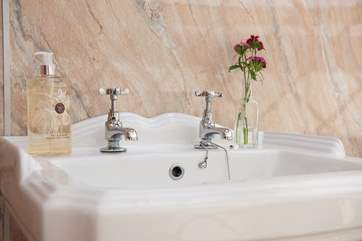 There is hot and cold running water to the sink.