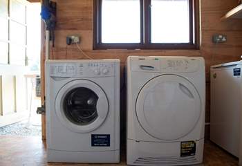 The shed also houses a washing machine, tumble-drier and space to store wetsuits etc.