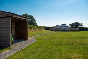 This is the view from the parking-area to the yurt. The handy shed contains logs for the wood-burner.