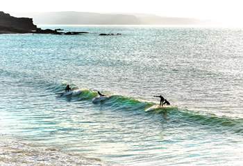 Head to the coast to watch the surfers enjoying the waves.