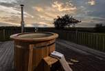 The wood-fried hot tub is just perfect for romantic evenings under the stars. 
