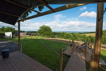 The hot tub has now been added but this photo shows you the decking area at the front of the shepherd's hut at this wonderful organic farm.
