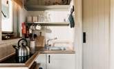 The small kitchen area is perfectly equipped for two. - Thumbnail Image