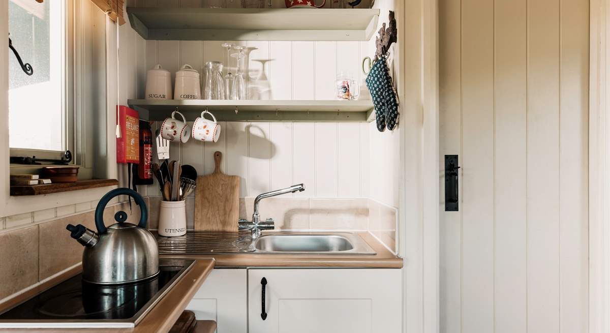 The small kitchen area is perfectly equipped for two.