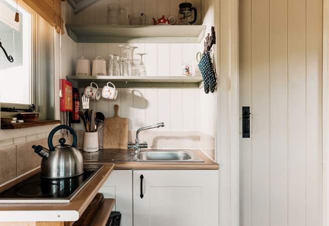 The small kitchen area is perfectly equipped for two.