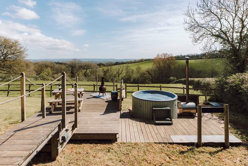 Relax on the sun soaked deck or roam the enclosed garden with your beloved pooch in tow!