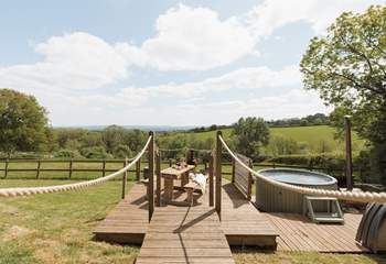 Relax on the sun soaked deck or roam the enclosed garden with your beloved pooch in tow!