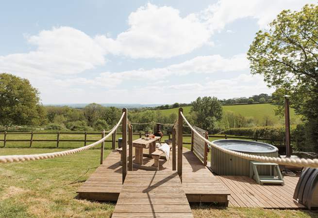 Relax on the sun soaked deck or roam the enclosed garden with your beloved pooch in tow!