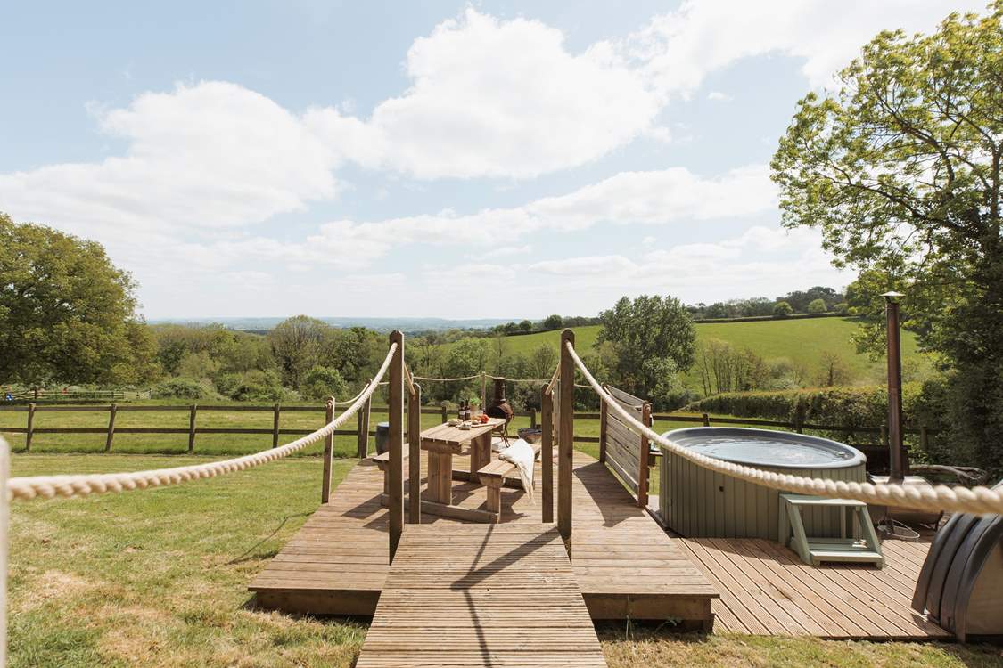 Relax on the sun soaked deck or roam the enclosed garden with your beloved pooch in tow!