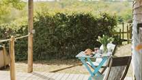 The veranda is an idyllic spot for your morning brew or afternoon tipple.