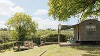 Perched in the rolling countryside, Shepherd's Oak boasts idyllic views of rural green pastures and gentle hills.