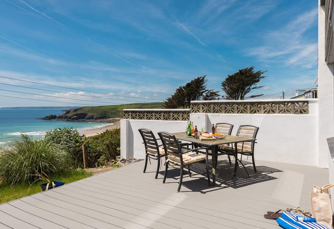 The large deck area is accessed from both the main bedroom and the study, there is also a path at the end of the garden that gets you to the beach without having to go back up to the lane.
