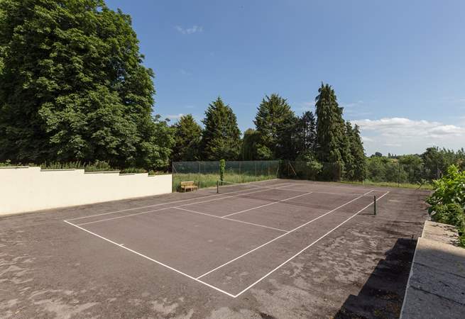 This cottage, and Orchard Barn next door, also have this shared tennis court to enjoy.