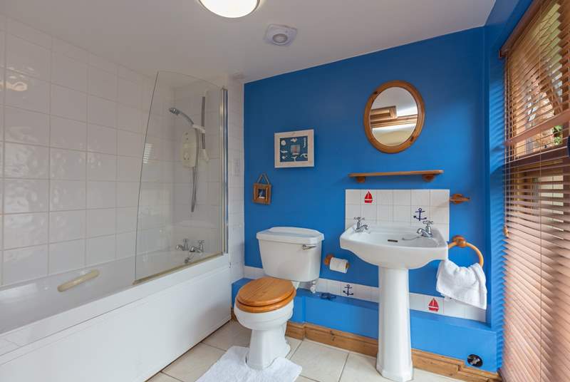 This cheerful family bathroom is on the ground floor.