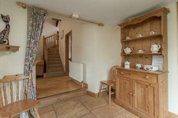 There is a lovely entrance hallway for the cottage. The doorway at the foot of the stairs is for the twin bedroom.