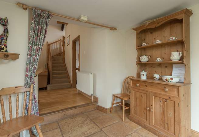 There is a lovely entrance hallway for the cottage. The doorway at the foot of the stairs is for the twin bedroom.