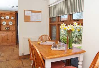 There is a bright and cheerful kitchen off the entrance hall