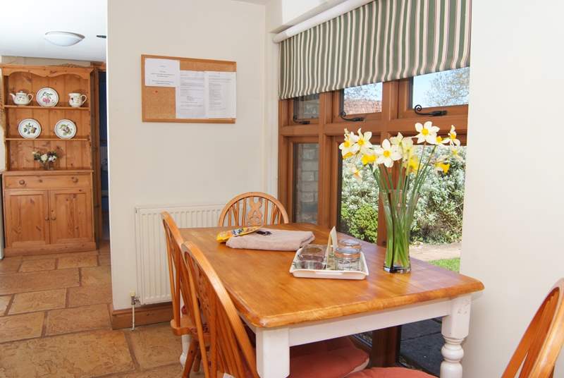 There is a bright and cheerful kitchen off the entrance hall