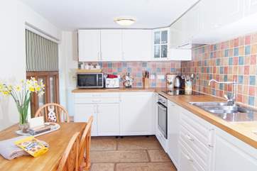 A view of the kitchen/dining room - well equipped with all that you need for your home from home stay.