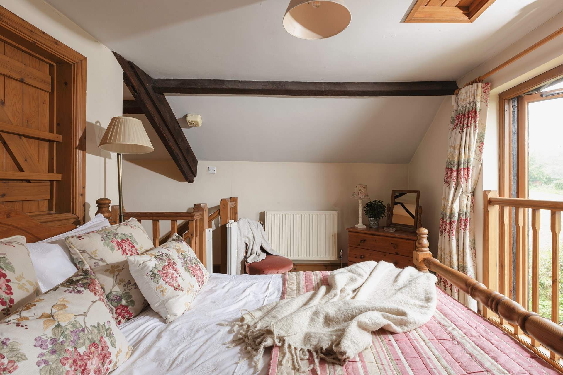 Another view of the main bedroom on the mezzanine level.