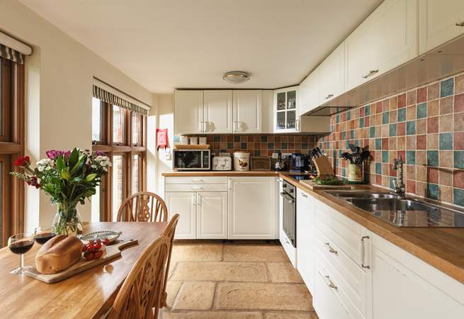 A view of the kitchen/dining room  - well equipped with all that you need for your home from home stay.