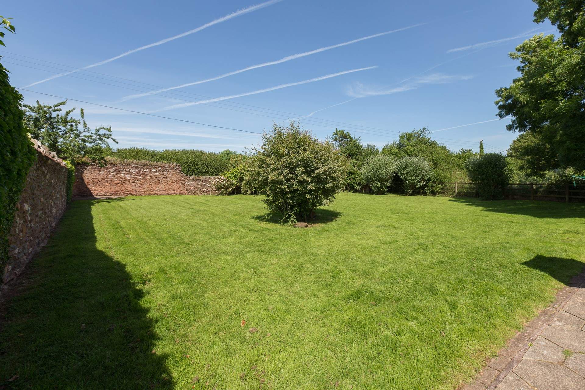 Another view of the fabulous space in the garden. An ideal safe place for a great run around for children or of course four legged friends.