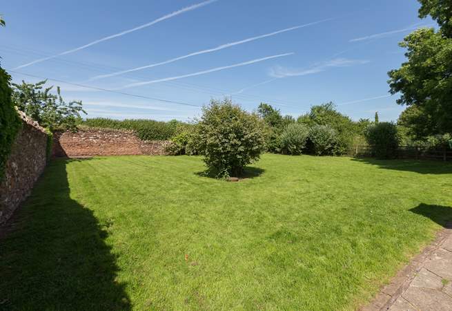 Another view of the fabulous space in the garden. An ideal safe place for a great run around for children or of course four legged friends.