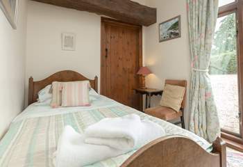 This is the single bedroom, another very comfortable room with views to the front of the cottage.